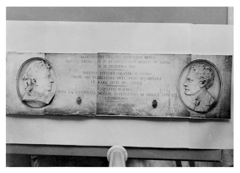 La plaque de marbre porte deux médaillons sculptés de profil.